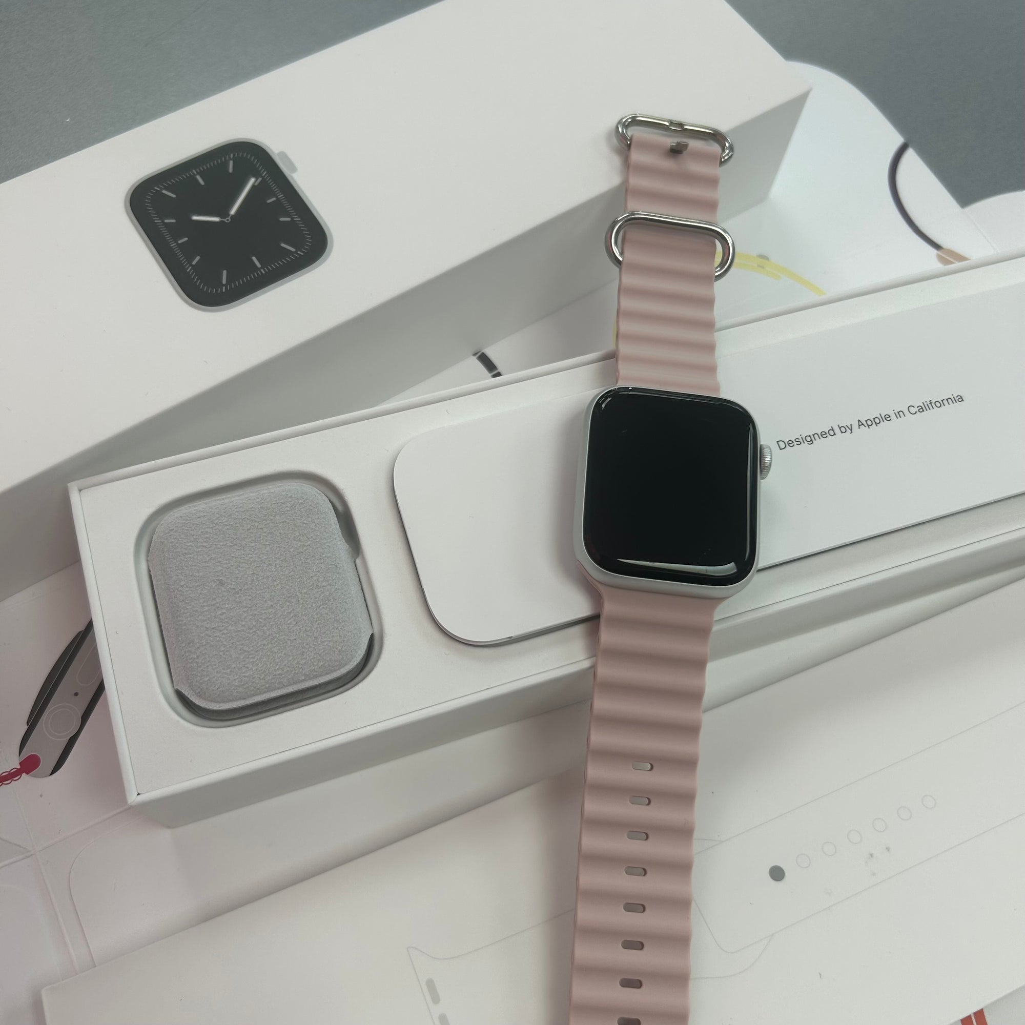 Apple Watch Series 5, 44mm GPS and Cellular Silver Aluminium Case & Pink Sports Band